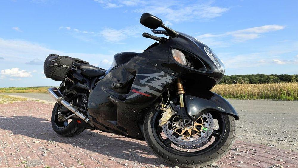 a sports bike parked on a road side
